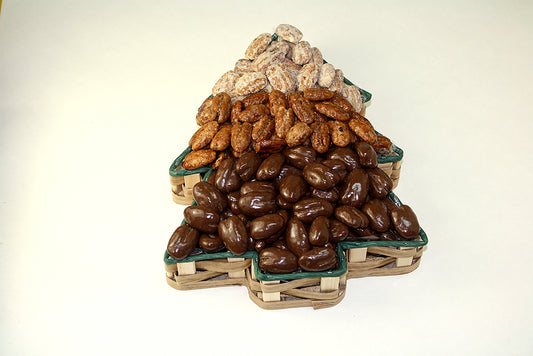 Various nuts in christmas tree shaped tin